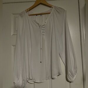 white silky puff sleeve top with lace up neckline